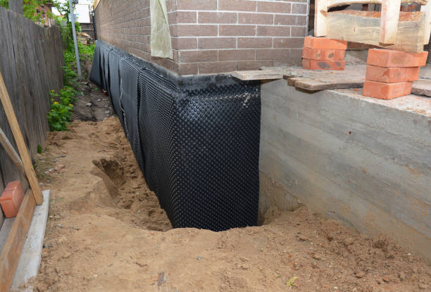 Happy homeowners after waterproofing job in Jacksonville
